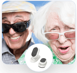 Elderly couple with sunglasses smiling