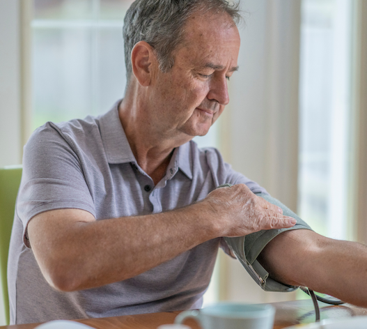 man taking blood pressure